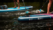 Load image into Gallery viewer, 10’6″ RIDE MSL SUP INFLATABLE PADDLE BOARD PACKAGE - RED PADDLE
